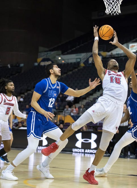 Theo Akwuba (10) pulls in the rebound during the University of Texas at Arlington vs. Louisiana men’s basketball game in the first round of the Sun Belt Conference championship tournament at the Pensacola Bay Center in Pensacola on Thursday, March 3, 2022.